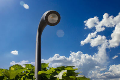 Low angle view of street light against sky