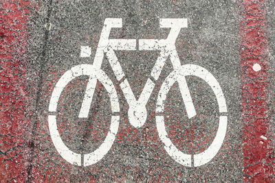 High angle view of bicycle sign on road