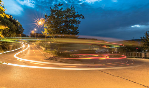 Light trails on road at night