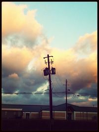 Low angle view of cloudy sky at sunset