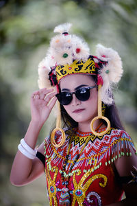 Portrait of young woman wearing mask