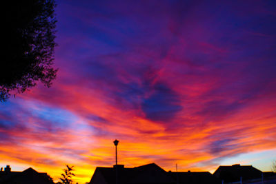 Low angle view of dramatic sky during sunset