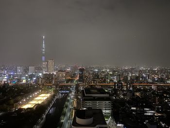 The night sky and the illuminated cityscape of tokyo