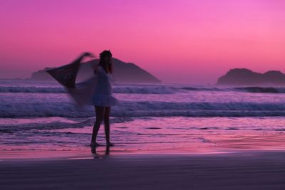 Scenic view of sea at sunset