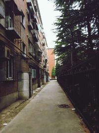 Narrow alley along buildings