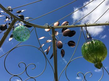 Low angle view of cables against clear blue sky