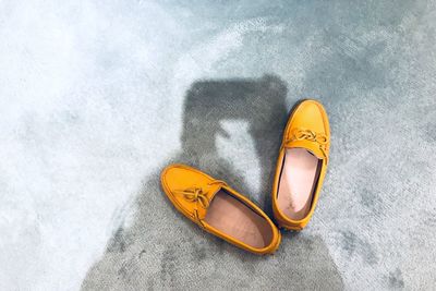 High angle view of shoes on floor