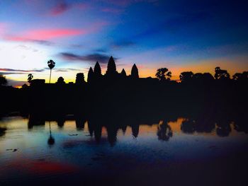 Reflection of clouds in water at dusk