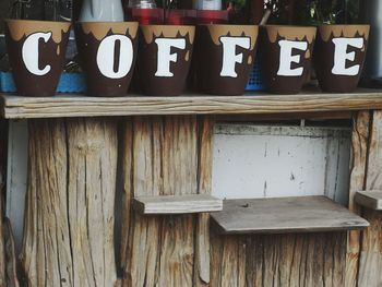 Coffee cups on shelf