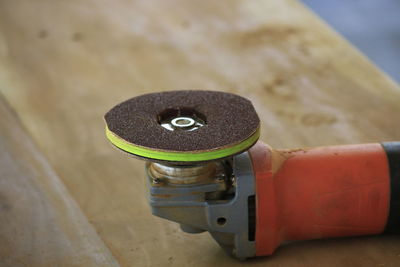 Close-up of coin-operated binoculars on table