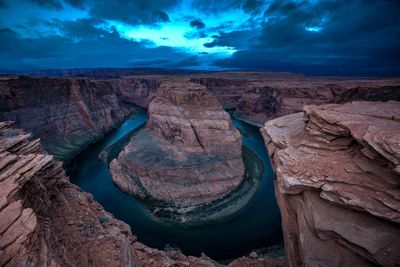 Scenic view of horseshoe bend at dusk
