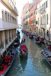 Boats moored in canal