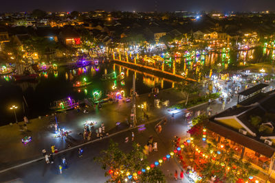 High angle view of illuminated cityscape at night