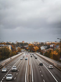 High angle view of cars on road against sky