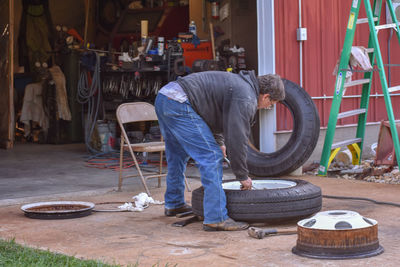 Man working on cart