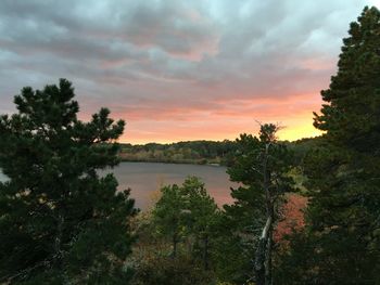 Scenic view of lake against sky during sunset