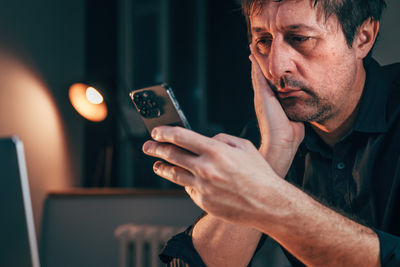 Man using mobile phone