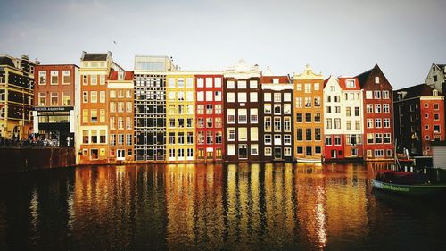 Buildings in city at dusk