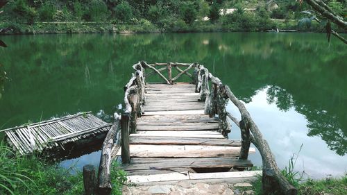 Wooden jetty on pier over lake