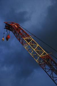 Low angle view of building against cloudy sky