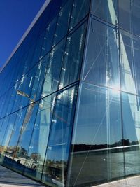 Low angle view of modern building against sky