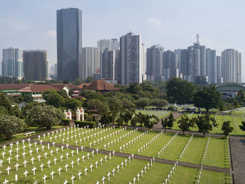 Buildings in city against sky