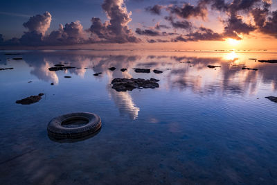 Scenic view of sea against sky during sunset