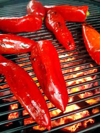 High angle view of sausages on barbecue grill