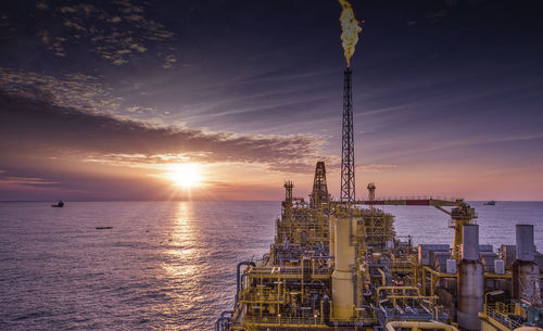 Scenic view of sea against sky during sunset