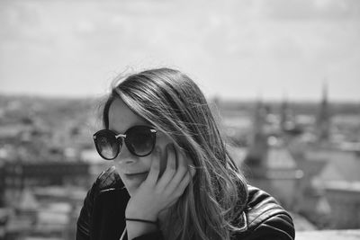 Close-up of young woman looking away