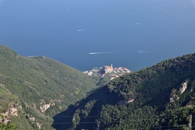 High angle view of trees and mountains against sky