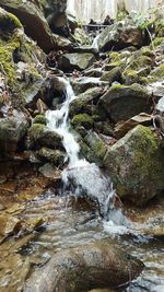 Stream flowing through rocks