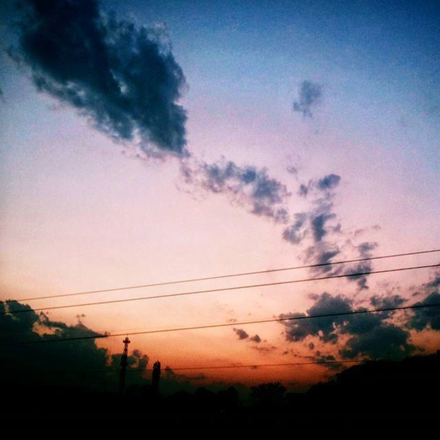 silhouette, sunset, sky, power line, electricity pylon, tranquility, beauty in nature, scenics, tranquil scene, nature, electricity, orange color, low angle view, power supply, cloud - sky, cloud, cable, idyllic, landscape, connection