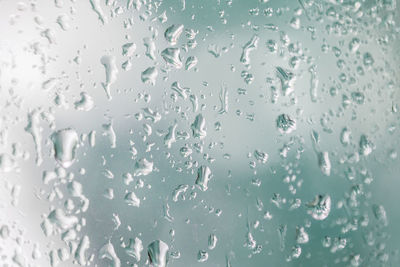 Full frame shot of water drops on glass