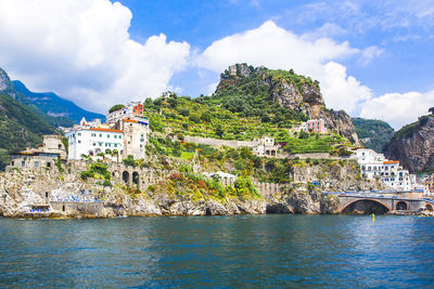 Panoramic view, aerial skyline of small haven of amalfi village colorful houses., salerno, italy