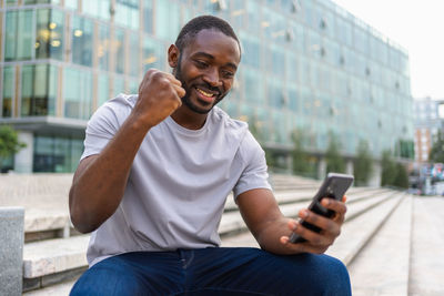 Young man using mobile phone