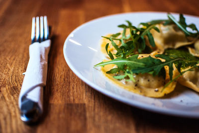 Close-up of food in plate on table