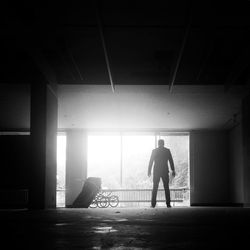 Silhouette man at home