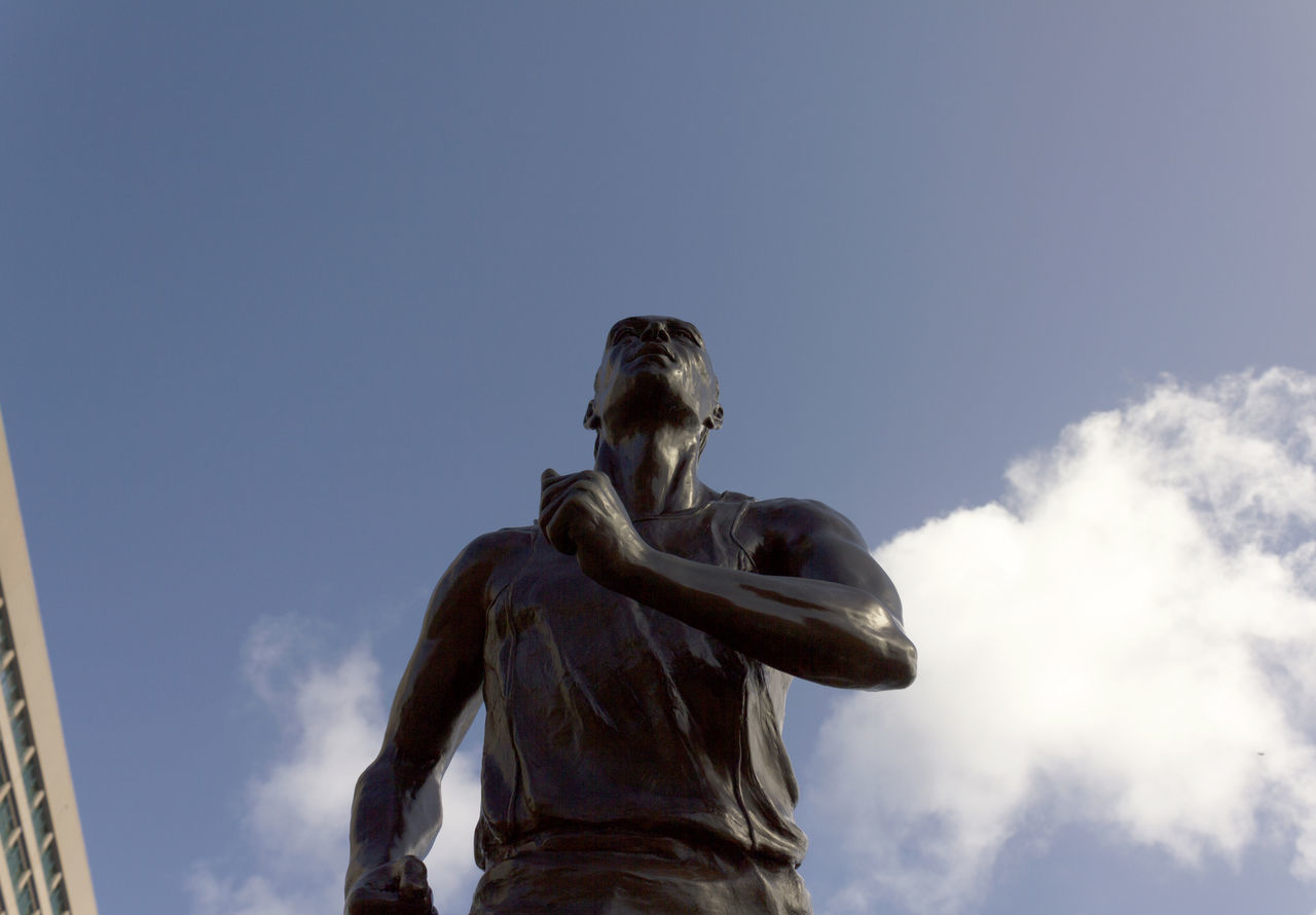 statue, human representation, sculpture, low angle view, art and craft, art, creativity, sky, animal representation, cloud - sky, monument, carving - craft product, outdoors, cloud, no people, day, angel, craft