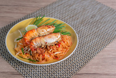 High angle view of fish in bowl on table