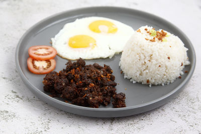 High angle view of food in plate on table