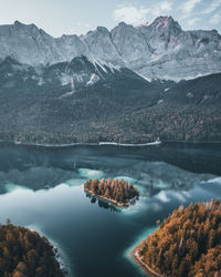 Scenic view of lake and snowcapped mountains