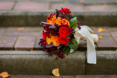 Rose bouquet on footpath