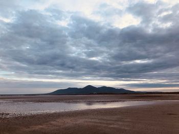 Scenic view of desert against sky