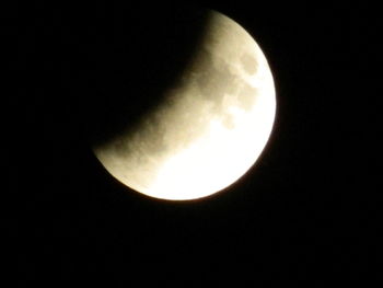 Low angle view of moon against sky at night