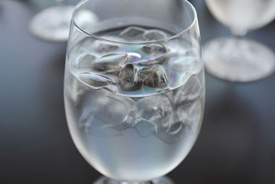 Close-up of drink in glass served on table