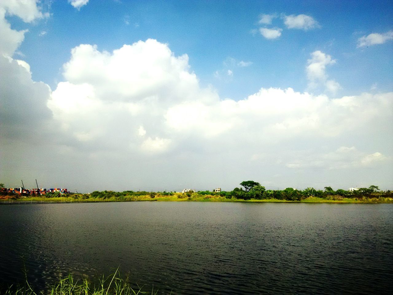 water, waterfront, sky, cloud - sky, tranquil scene, tranquility, scenics, beauty in nature, rippled, cloud, nature, tree, cloudy, lake, river, sea, idyllic, blue, day, outdoors