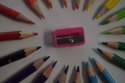 High angle view of colored pencils on table