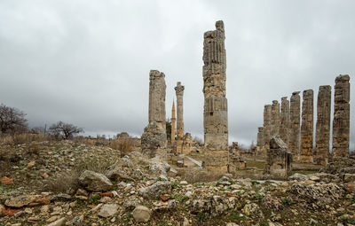 Low angle view of old ruins against sky