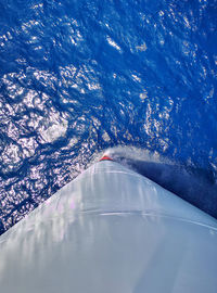 Aerial view of a ships bow in blue sea